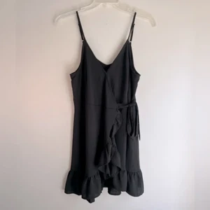 Entro Gr. L schwarz V-Ausschnitt ärmellos Rüschen Mini Wickelkleid neu ohne Etikett - Bild 1 von 7