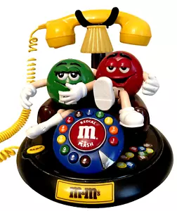 Teléfono fijo M&M mango amarillo con caracteres M&M rojos y verdes  - Imagen 1 de 10
