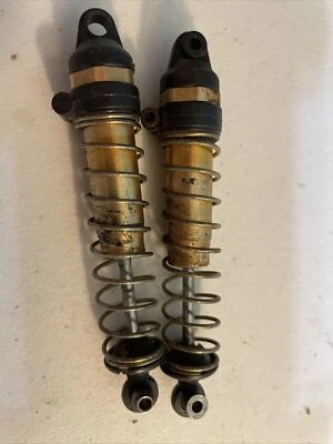 RC10 6010 Gold TEAM ASSOCIATED VINTAGE RC10 BUGGY Rear SHOCKS - Image 1 of 4
