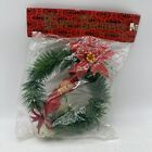 Couronne de fleurs vintage elfe de Noël pixie genou étreinte sur cloches - lire