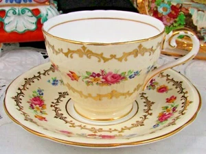 AYNSLEY FLORAL SPRAYS FANCY GOLD GILT DESIGNS BEIGE TEA CUP AND SAUCER - Picture 1 of 7