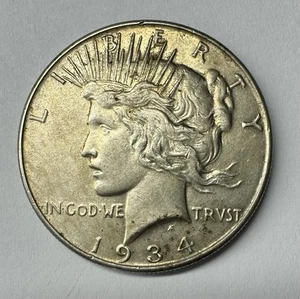 1934-P Silver Peace Dollar - Nice Coin - Picture 1 of 2