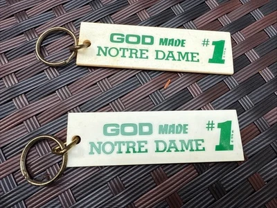 (2) Vtg Notre Dame Key Chain Ring “God Made Notre Dame#1” 1976 Lot Set - Image 1 of 4