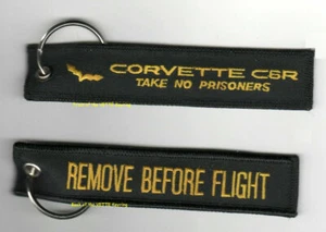 CORVETTE RACING TEAN REMOVE BEFORE FLÜGHT "TAKE-NO-PRISONERS" 2-KEYRING (yellow) - Picture 1 of 7