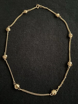 Collar vintage 1977 Avon delicado nudos de amor tono dorado 17" Foto 1 de 4