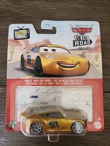 Rusteze Dinoco ORO Cruz Ramirez Disney CARS pressofuso nuovo con scatola piccola scatola danneggiata - Foto 1 di 4