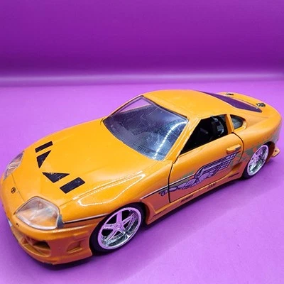 The Fast and Furious 1995 Toyota Supra Diecast Car 1:32 Scale 5" Orange - Image 1 of 4