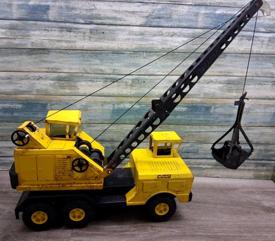Camión grúa pala Michigan de juguete de colección NYLINT T-24 acero prensado amarillo Foto 1 de 4