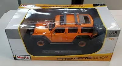 Maisto PREMIERE Edition 1:18 Scale 2014 Jeep Wrangler RESCUE CONCEPT Orange - Image 1 of 4