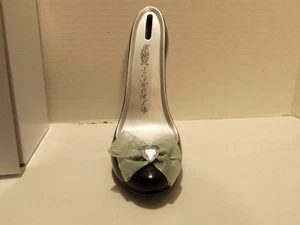 PENGUIN HI-HEEL SHOE BANK- SEA WORLD LOGO- RESIN -VERY RARE-NEW- VINTAGE - Bild 1 von 1