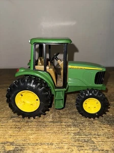John Deere Green Tractor toy by Ertl 7" long, 5 1/2" high - Picture 1 of 6
