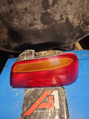 97-00 CHRYSLER SEBRING Right Tail Light  Turn Signal Passenger Side Rh OEM - Image 1 of 4