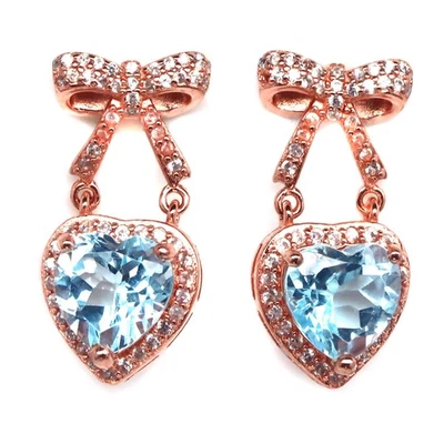 925 Sterling Silver 8 x 8 MM. Sky Blue Topaz & White Zircon Birthstone Earrings - Image 1 of 4