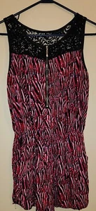 Mameluco rosa intenso con estampado de cebra negro talla M. - Imagen 1 de 4