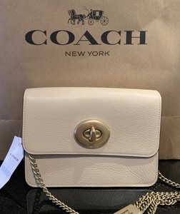 coach bolsa cream