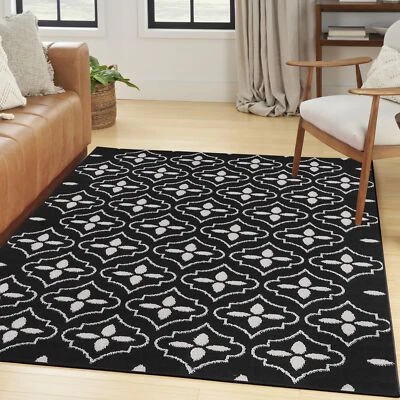 Alfombra Urison Essentials interior/exterior negro marfil 4' x 6' fácil limpieza Foto 1 de 4