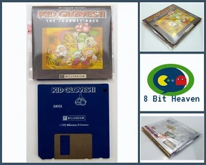 GUANTES NIÑOS II EL VIAJE DE REGRESO POR MILLENNIUM COMMODORE AMIGA - PROBADOS Y FUNCIONANDO - Imagen 1 de 8