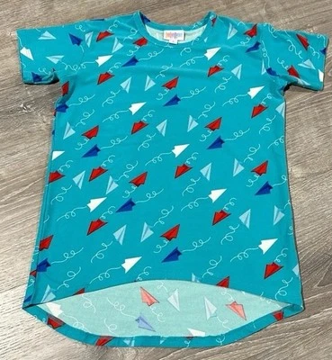 Camiseta túnica Lularoe niñas aviones de papel talla 8 azul, verde azulado y rojo Foto 1 de 4