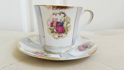 Norleans Porcelain China Blue striped and traditional scene Teacup & Saucer - Image 1 of 4