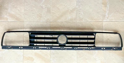 NOS OEM Volkswagen-Germany 88-92 VW MK2 Golf Jetta Radiator Grille 165 853 653E Foto 1 de 4