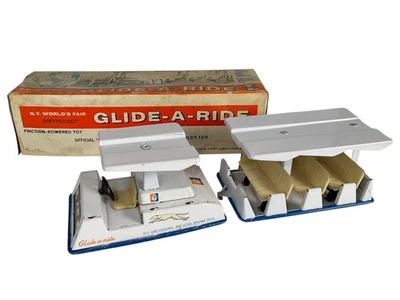 1964 NY WORLD'S FAIR GLIDE-A- RIDE GREYHOUND METAL TOY w/ BOX LOWELL # - Image 1 of 4