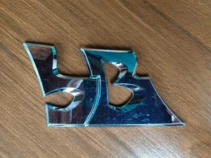 Toyota bB Scion xB 2008-15 QNC21 JDM Rear bB  Emblem badge Genuine 75442-B1040 - Picture 1 of 7