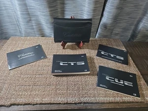 2014 CADILLAC CTS OWNERS MANUAL/ INFOTAINMENT MANUAL  INCLUDED WITH OEM CASE - Picture 1 of 8