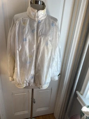 ADIDAS WOMEN IVORY JACKET WITH BLUE DESIGNS INSIDE-SIZEL-NWOT-NAME ON TOP OF ZIP - Imagem 1 de 4