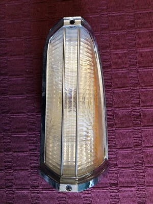 1973 1974 1975 1976 Oldsmobile Toronado LH Turn Signal Lens & Chrome Bezel NOS - Image 1 of 4