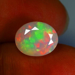 2.31Ct Oval 10.6X8.6 MM Multi Colors Dancing Ethiopia Natural Rainbow Fire Opal - Picture 1 of 5