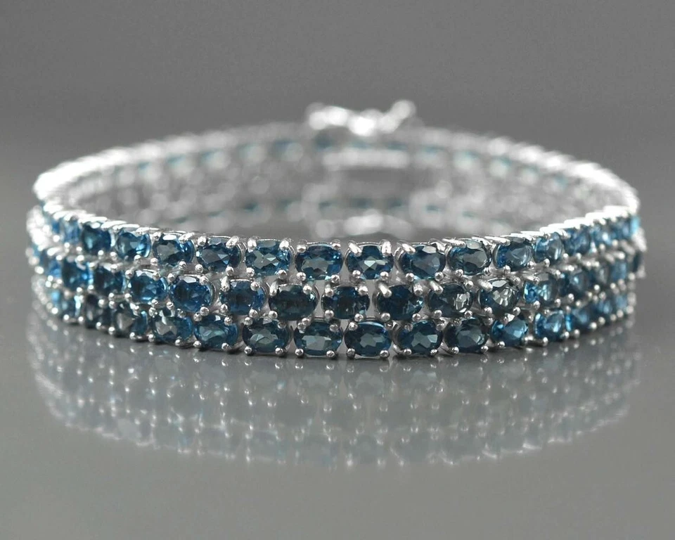 Pulsera tenis de plata de ley 925 con piedras preciosas ovaladas de topacio azul de Londres regalo para ella Foto 1 de 4