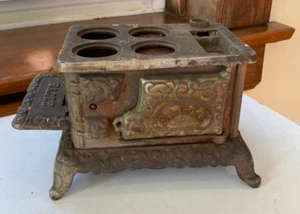 Gusseisen Miniatur Spielzeug Ofen ADLER Verwendung für Ersatzteile - Bild 1 von 8