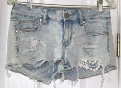 Women's Jean Shorts American Eagle Shortie Super Stretch White Lace Pockets Sz 4 - Image 1 of 4