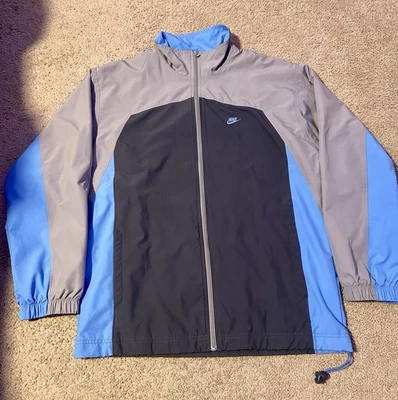 Chaqueta cortavientos vintage Nike para hombre talla mediana gris forrada azul Foto 1 de 4