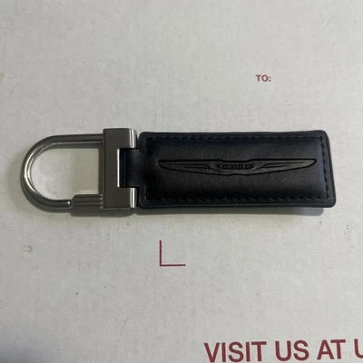 Llavero Chrysler de cuero negro defectuoso Foto 1 de 4