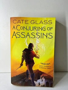 A Conjuring of Assassins Cate Glass Fantasy Novel Paperback Tor Books 2020 - Imagen 1 de 7