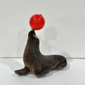 Mini sello flocado vintage de Alemania Occidental artesanal Kunstlerschutz con animal de bola - Imagen 1 de 4