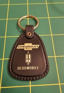 Vintage Ben Bissett Chevrolet Oldsmobile, Mercer PA, Black Plastic Keychain B2b6 - Picture 1 of 2