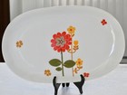 Vintage  PLAT OVALE porcelaine de LOURIOUX décor fleurs orange jaune années 70