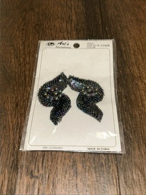 Aplique de cuentas Arts International tono años 80 Foto 1 de 4