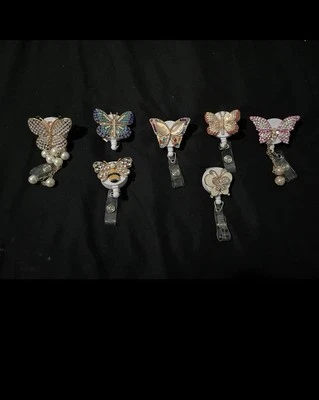 Porta Insignia de Identificación Retráctil Mariposa, Carrete Insignia Mariposa, Clip Mariposa  Foto 1 de 4
