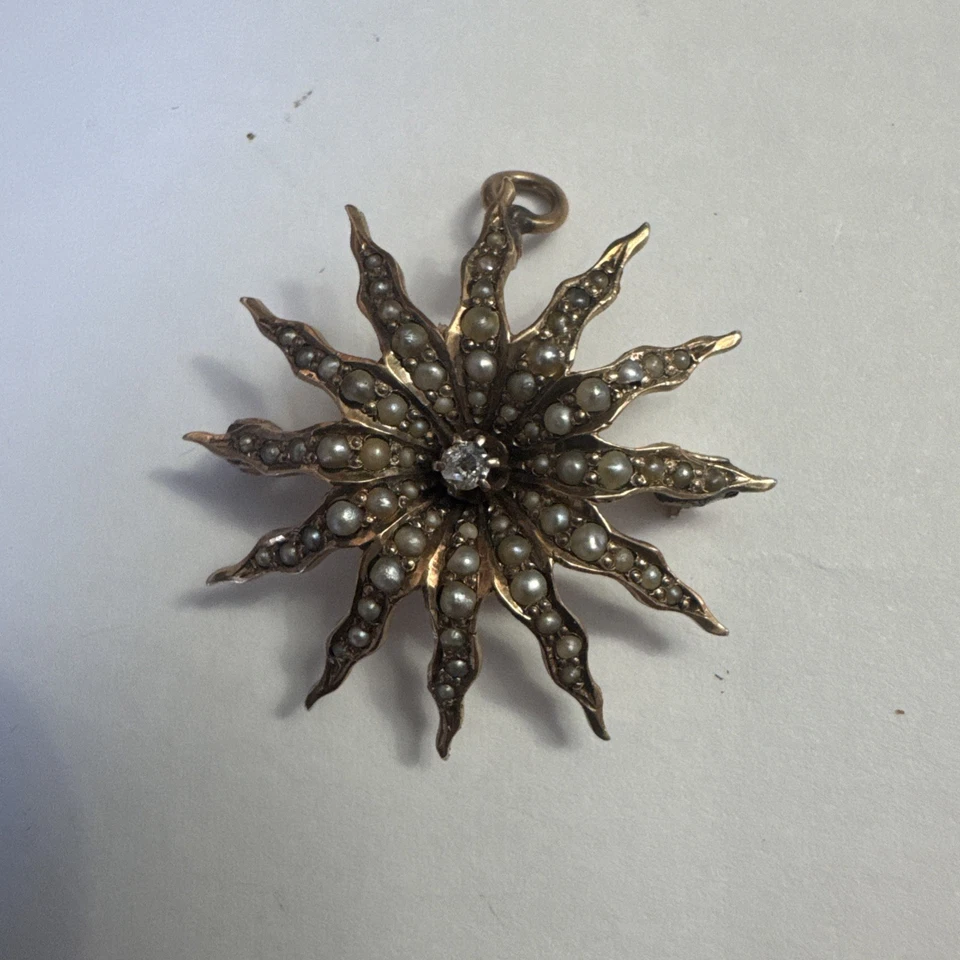 Broche colgante victoriano de oro de 14 quilates y diamantes Sunburst Foto 1 de 4