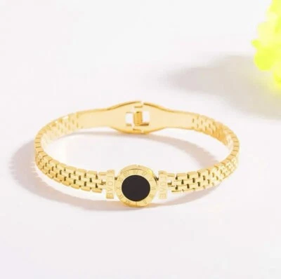 Brazalete Eli chapado en oro de 18 quilates de acero inoxidable negro y dorado Foto 1 de 2