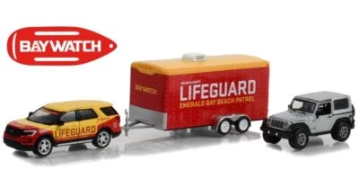 FORD Explorer 2016 + Jeep Rubicon 2013 + Trailer  - Baywatch - Greenlight 1:64 - Immagine 1 di 4