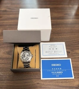 Reloj Hombre Seiko V147-0AG0 Solar Titanium Diver's 200 con Caja y Manual - Imagen 1 de 6