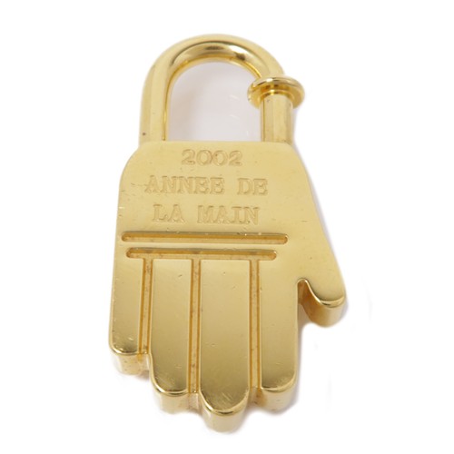 HERMÈS Charm HERMES GHW metallo oro