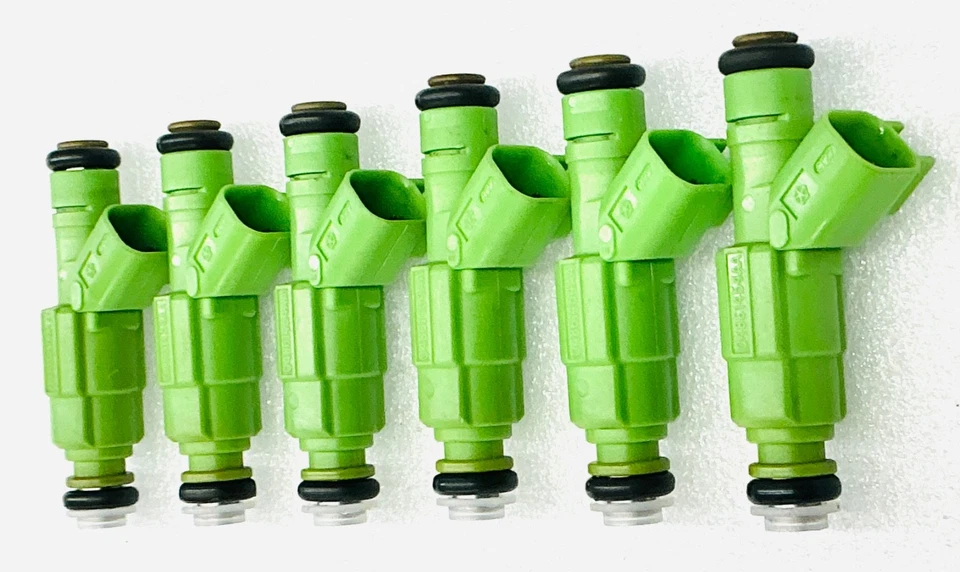 Juego de inyectores de combustible originales Bosch 4 orificios actualización Jeep 4,0 L 1999-2004 Cherokee + Foto 1 de 4