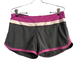 Pantaloncini Lululemon Run Times donna 8 tasche viola foderate tempo libero **PICCOLO difetto - Foto 1 di 12