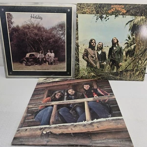 Lot Of 3 80s The Band "America" Vinyl Lps, Holiday, Hideaway, & Hat Trick - Picture 1 of 13