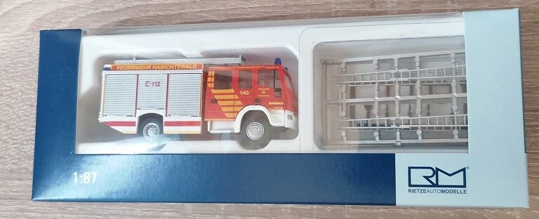 Rietze 68309 - 1/87 Magirus Alufire HLF 10 FW Habichtswald - Nuovo - Immagine 1 di 1